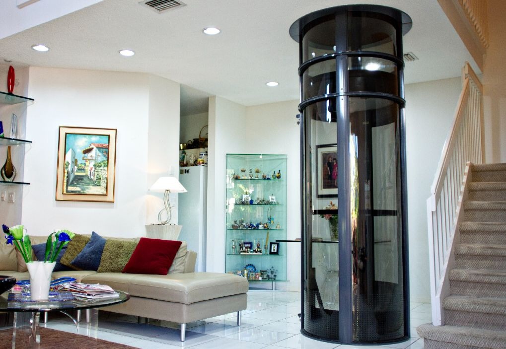Home elevator installed between floors in a modern residential living room